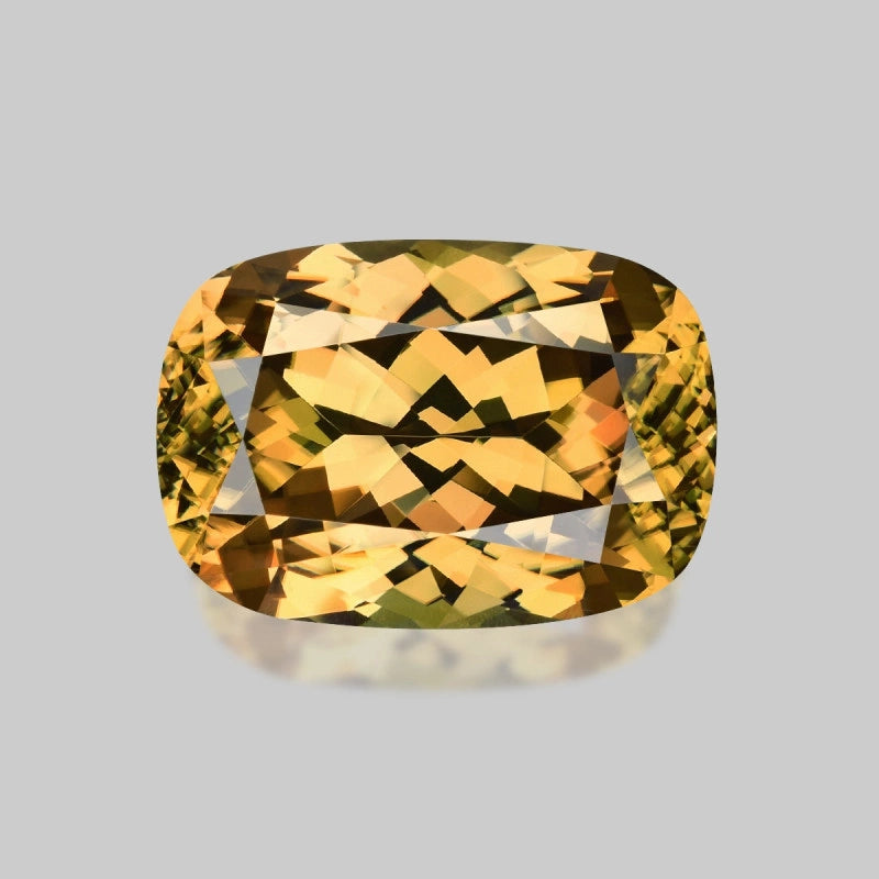 Loupe Clean custom precision cushion-cut golden yellow zircon.