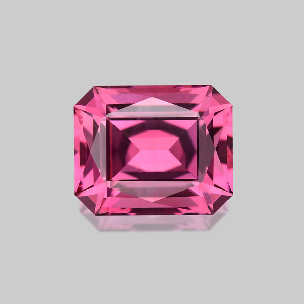 Flawless, custom precision emerald-cut pink Mahenge garnet.