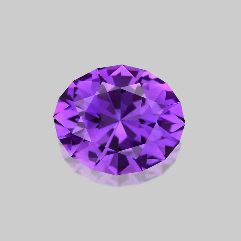 Exquisite precision-cut rich purple Rwandan amethyst.