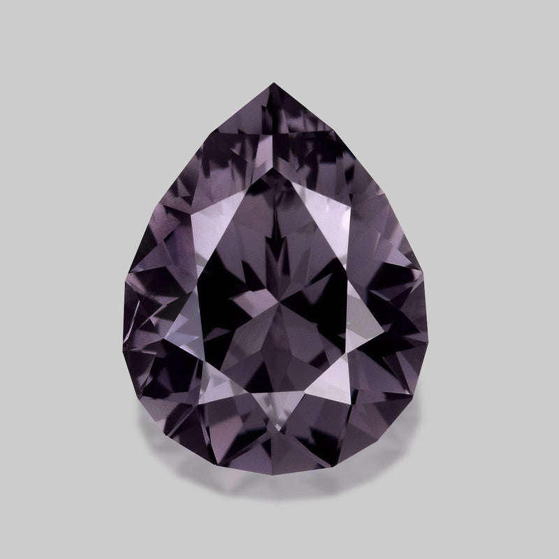 Flawless precision-cut greyish purple Mahenge spinel.