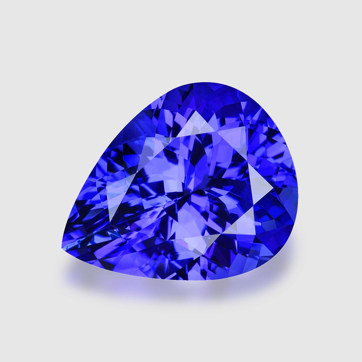 Loupe Clean, precision pear-cut purplish blue tanzanite.