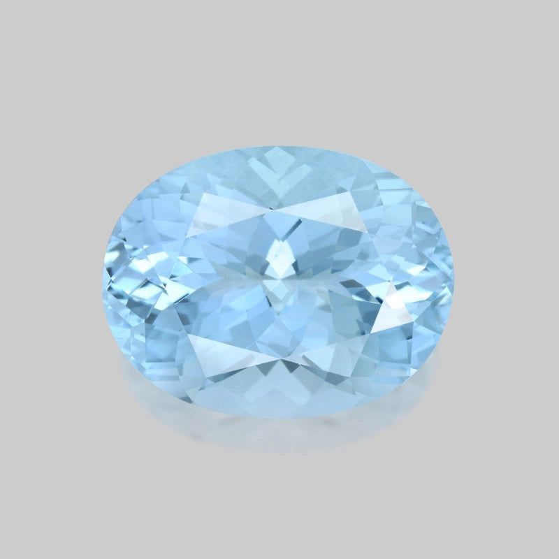 Loupe Clean, precision oval-cut neon blue aquamarine.