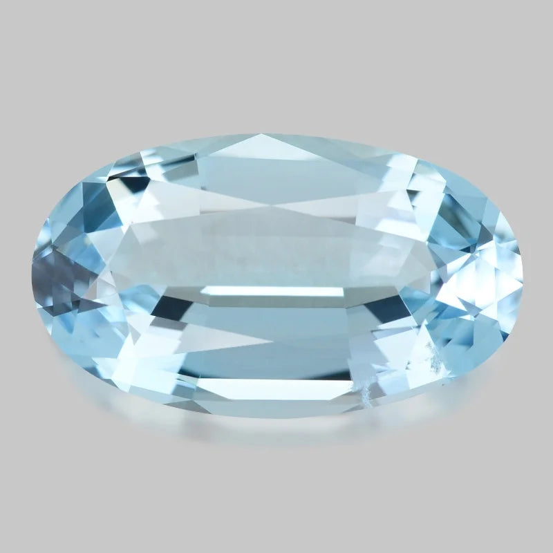 Elongated precision oval-cut medium blue aquamarine.