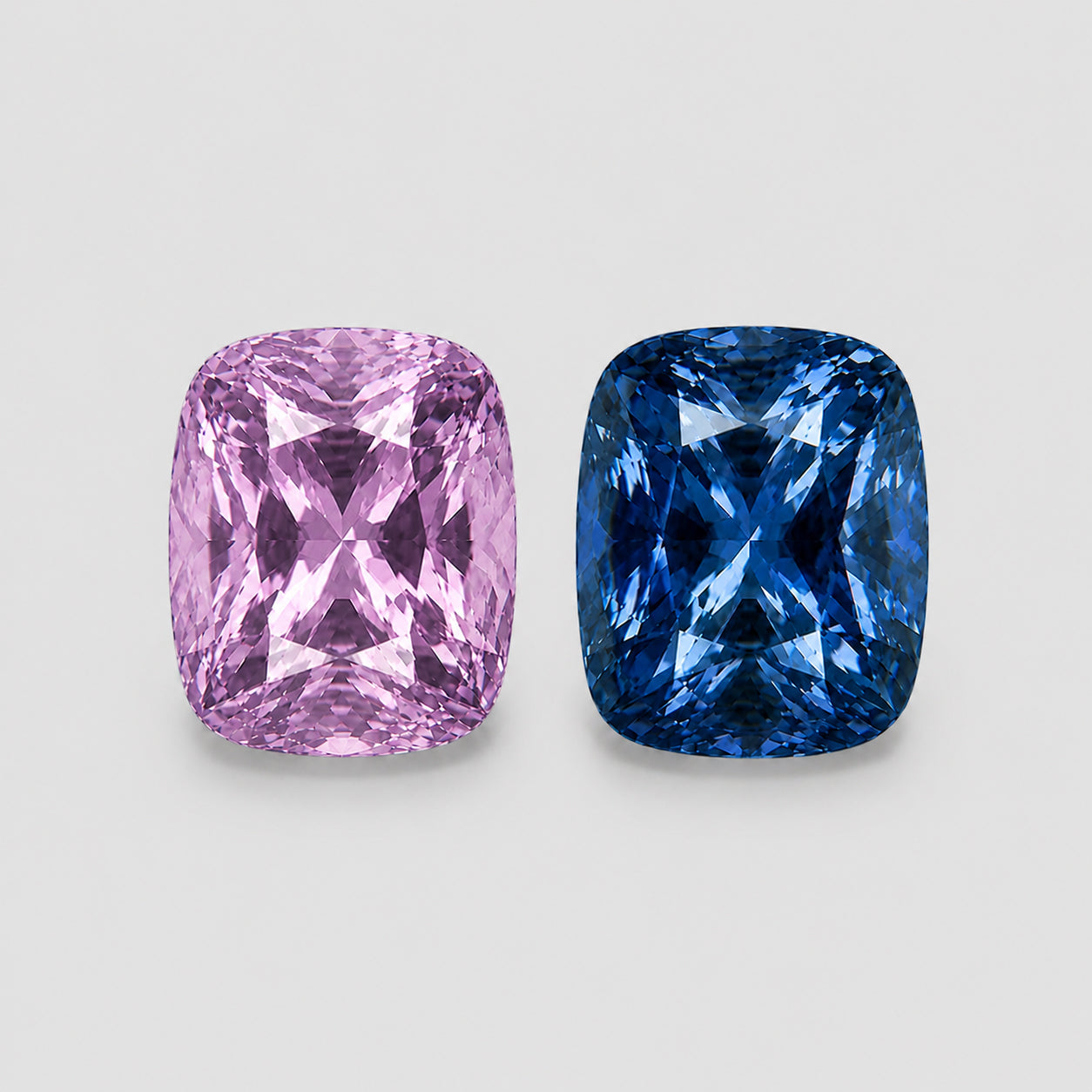Reverse-pair, precision-cut blue & pink Mahenge spinel.