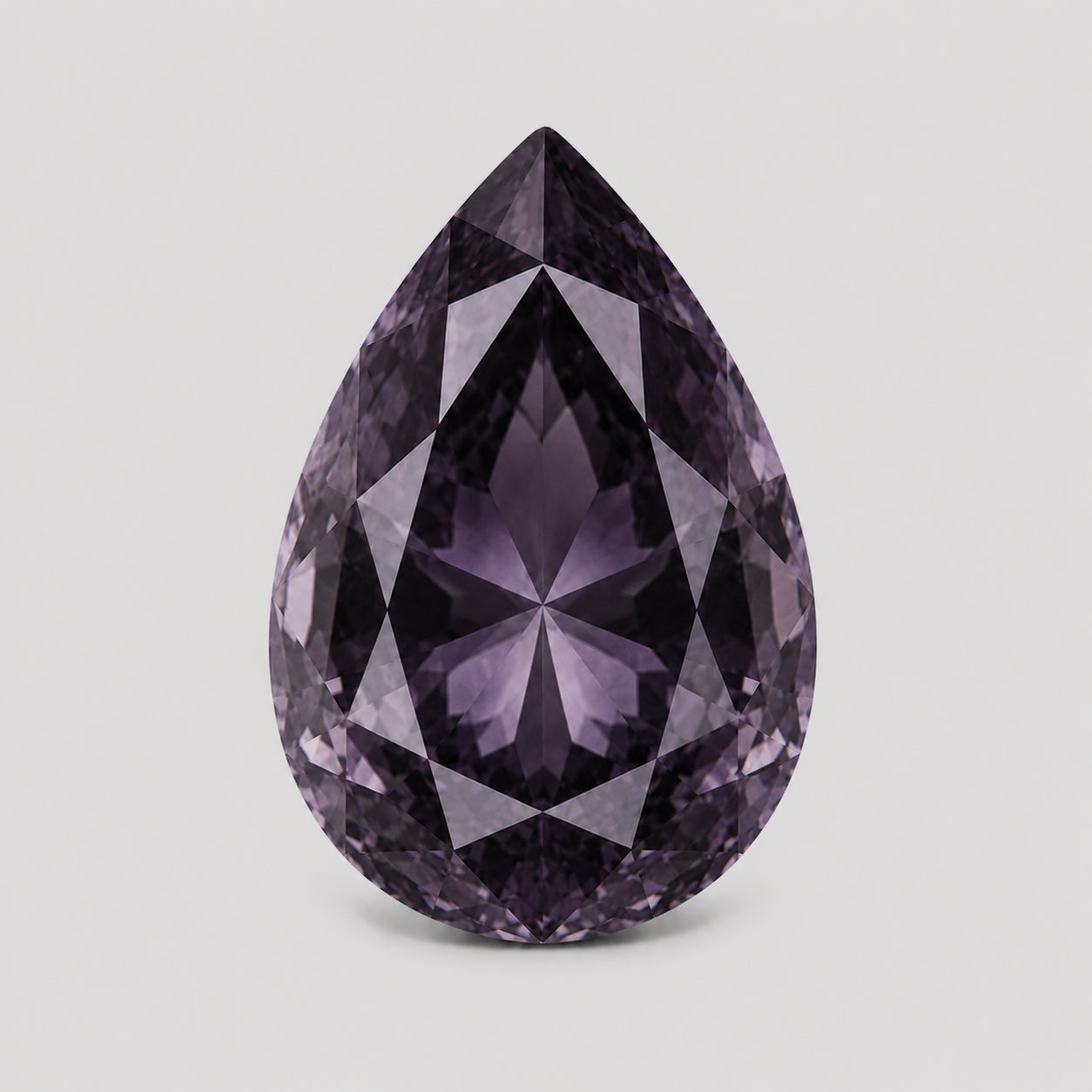 Unheated custom precision pear-cut violet sapphire.