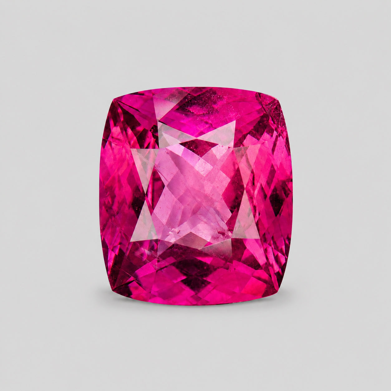 GIA Certified, custom cushion-cut purple-red Winza ruby.