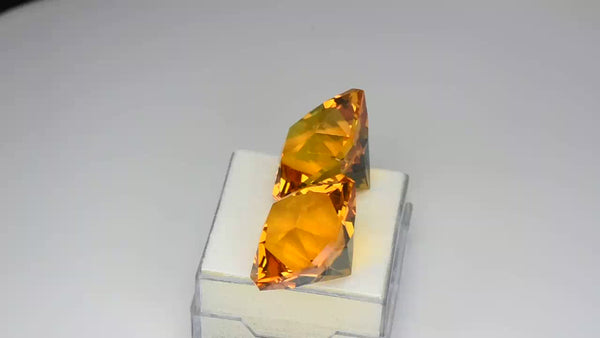 High-gem pair, golden yellow Madeira citrines.