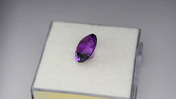 Exquisite precision-cut rich purple Rwandan amethyst.