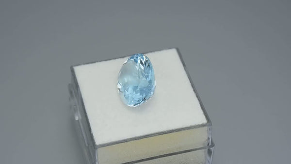 Flawless, custom precision oval-cut neon blue aquamarine.