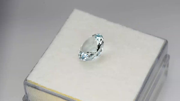 Gorgeous precision round-cut light blue aquamarine.