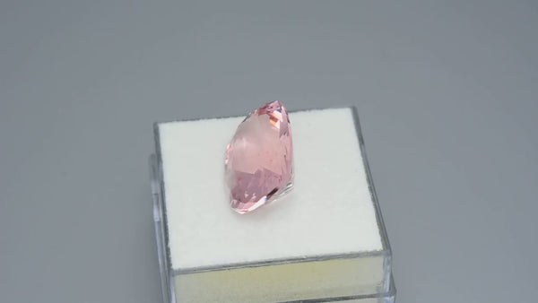 Exquisite custom precision-cut neon pink morganite.