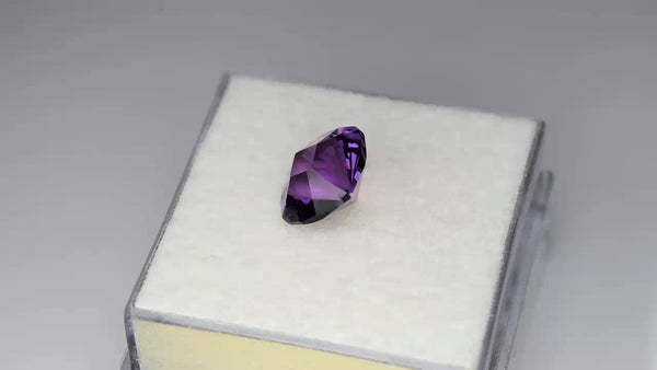 Flawless custom precision cushion-cut purple amethyst.