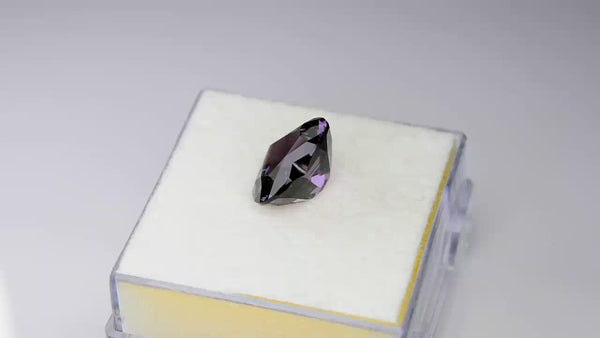 Exquisite, custom precision-cut lustrous rich bright purple spinel.