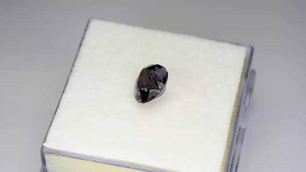 Flawless precision-cut greyish purple Mahenge spinel.