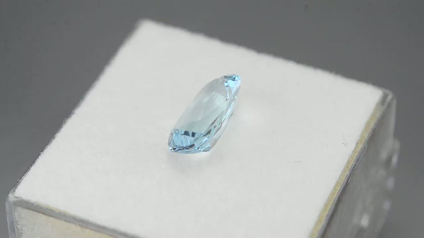 Elongated precision oval-cut medium blue aquamarine.