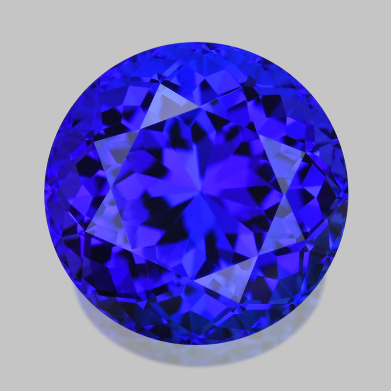 Flawless, custom precision-cut vivid purplish blue tanzanite.