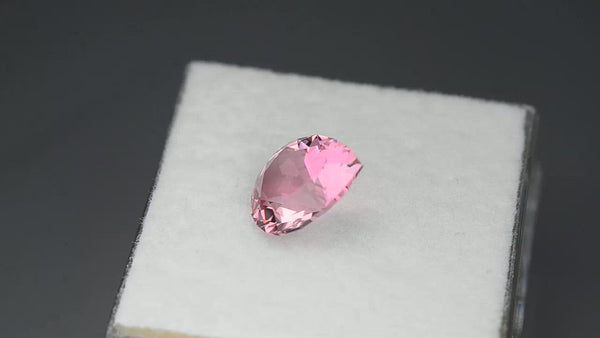 Flawless, custom precision-cut fiery neon pink tourmaline.