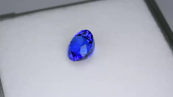 Flawless, custom precision-cut vivid purplish blue tanzanite.