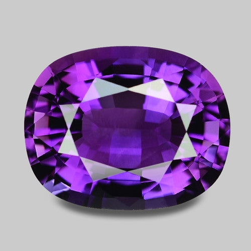 Natural precision cushion cut rich purple Rwandan amethyst.