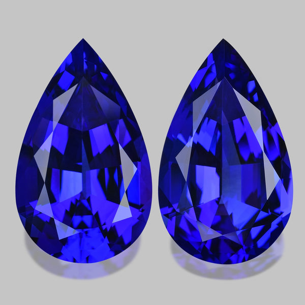 Flawless matching pair, neon purplish blue tanzanites.