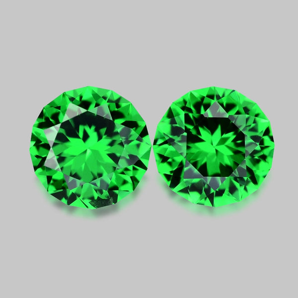 High gem precision-cut matching pair vivid green tsavorites.