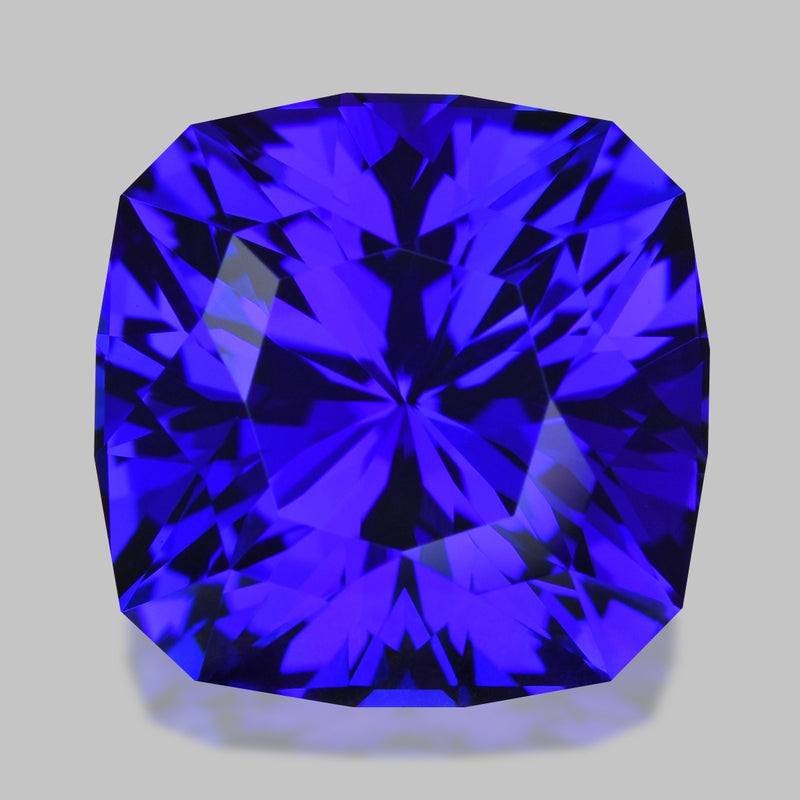 Flawless, custom precision-cut vivid purplish blue tanzanite.