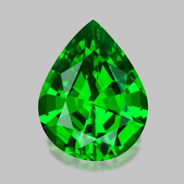 High gem, custom precision-cut vivid green tsavorite garnet.