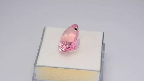 High gem custom oval-shaped Brazilian pink morganite.