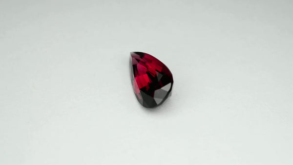 Flawless, custom precision-cut red Mahenge garnet.