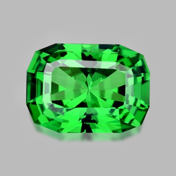 Flawless, precision cushion-cut vivid green Tsavorite garnet.