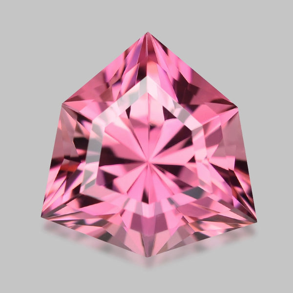 Unique gem, kite-cut fiery neon pink tourmaline.