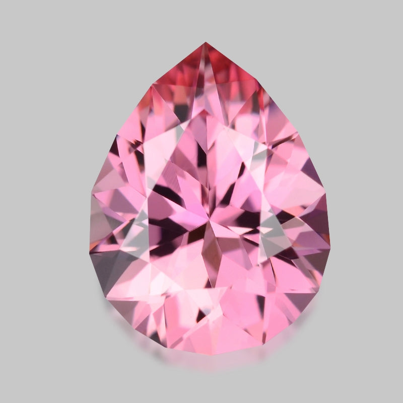 Flawless, custom precision-cut fiery neon pink tourmaline.