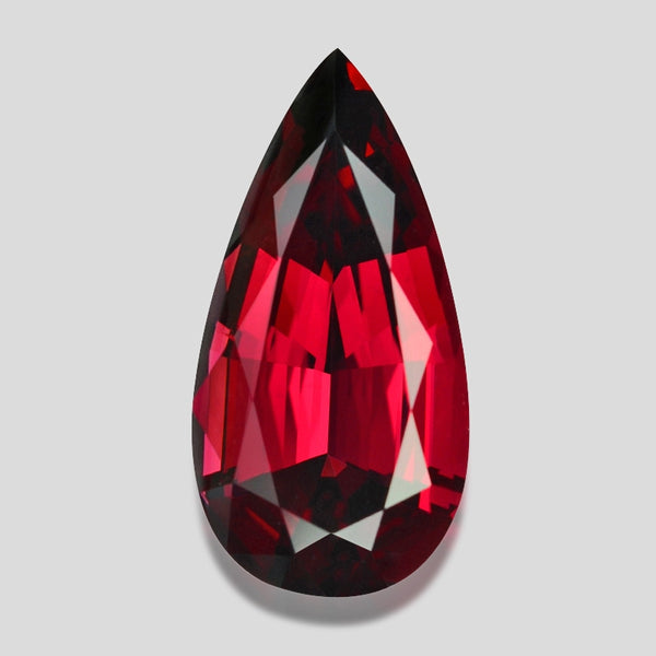 Flawless, custom precision-cut red Mahenge garnet.