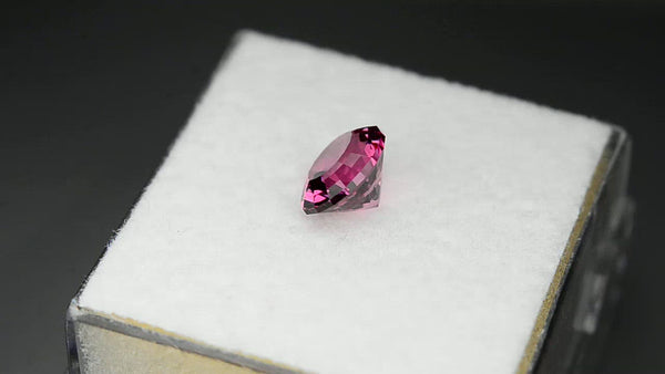 Flawless, custom precision-cut Mahenge garnet.