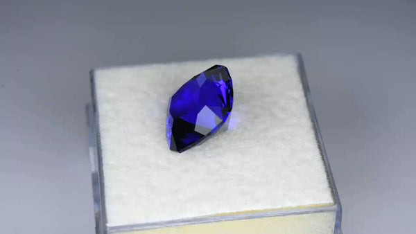 Flawless, custom precision-cut vivid purplish blue tanzanite.